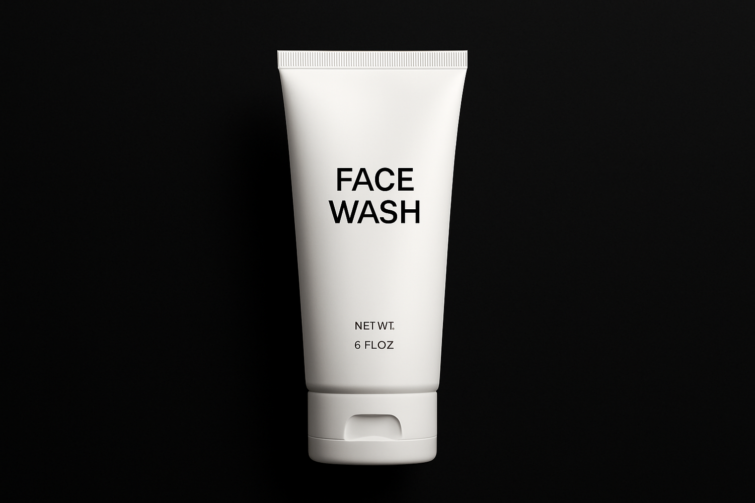 A white face wash tube in black background
